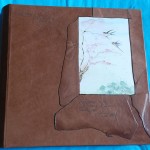 album di pelle con foto decorato a mano